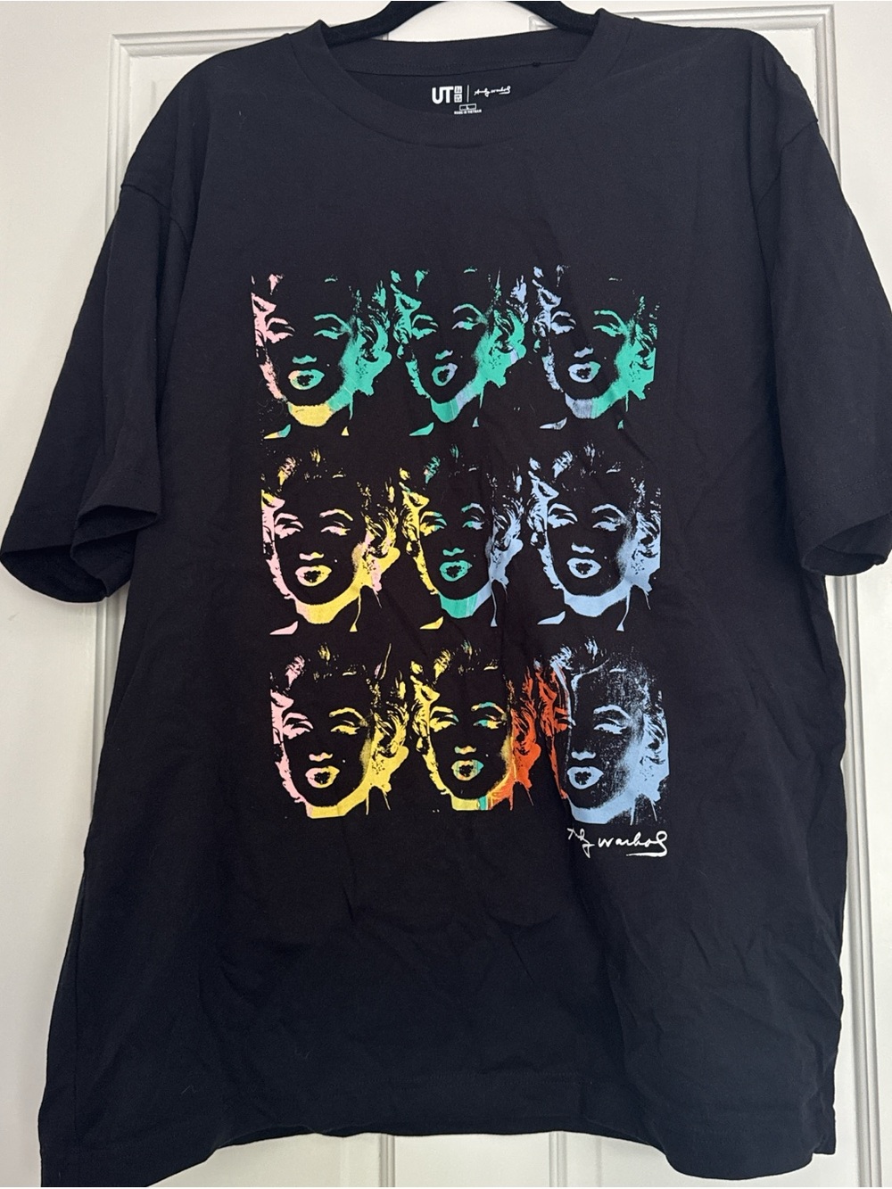 Uniqlo Black Graphic Tee with Multicolor Pop Art Faces